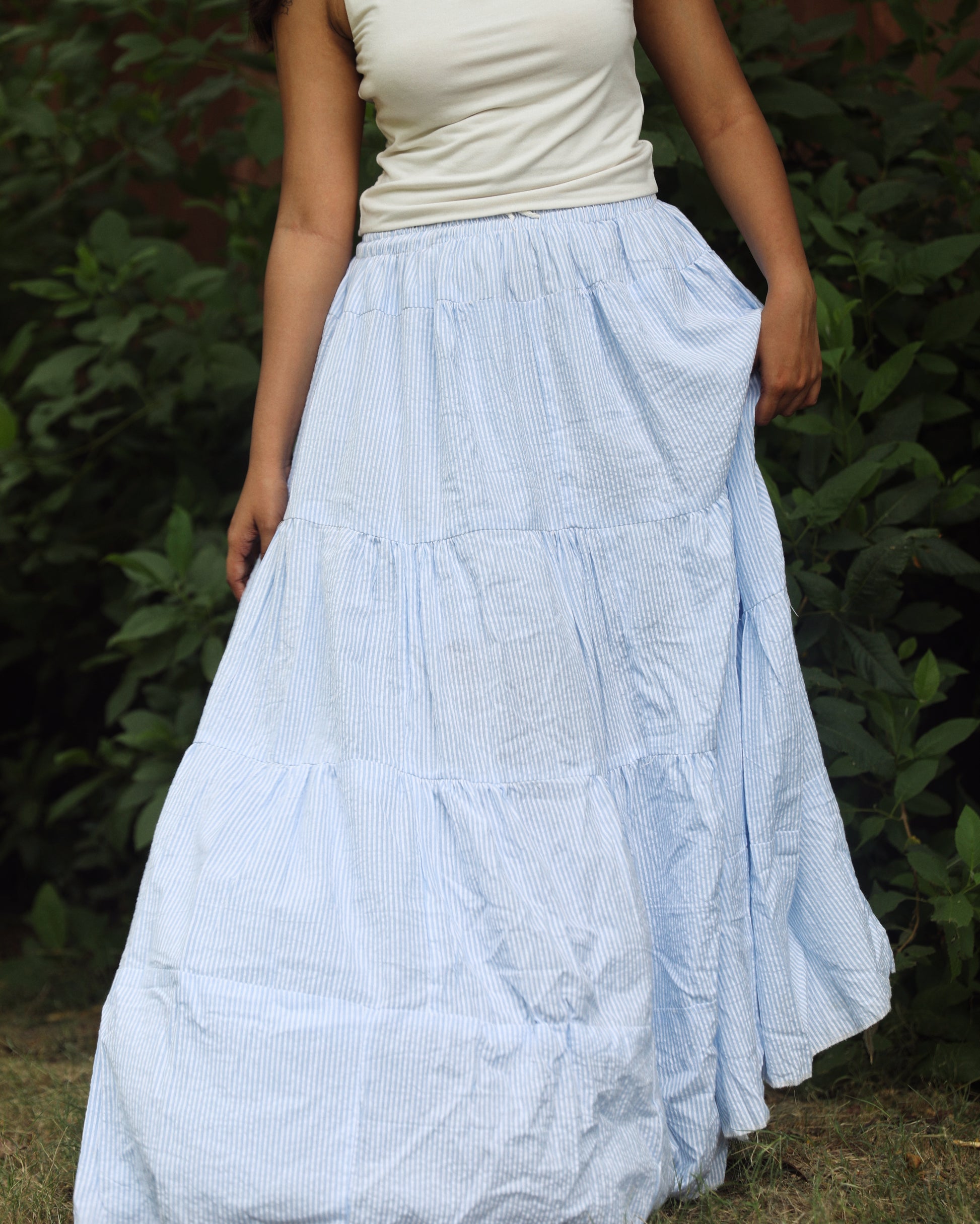 Cotton maxi skirt wit
h vertical white and blue stripes for everyday wear